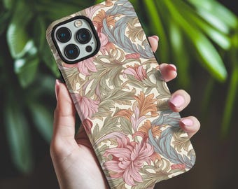 May include: A smartphone case featuring an intricate, repeating botanical pattern with stylized acanthus leaves and floral elements in muted shades of dusty pink, sage green, and soft orange against a cream-colored background with a black camera cutout.