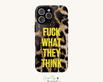 May include: A rectangular smartphone case featuring a brown and black leopard print pattern. The text FUCK WHAT THEY THINK is printed in bold yellow capital letters across the center of the case. The camera lens cutout is visible at the top.