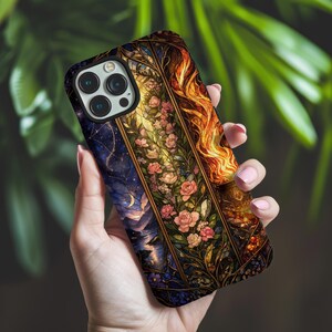 May include: A smartphone case featuring a vertical design with a dark blue starry night sky on the left, a central panel of pink roses and green foliage, and a vibrant orange and yellow flame pattern on the right side with a black camera cutout.