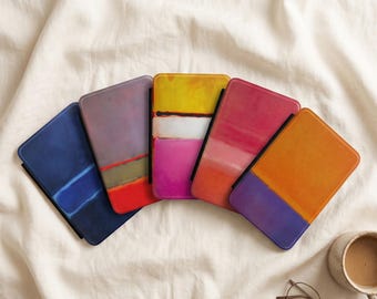 May include: Five rectangular cases with rounded corners, each featuring a unique abstract color-blocked design. The color palettes include blue, purple, red, yellow, pink, orange, and white, arranged in horizontal bands across the surfaces.