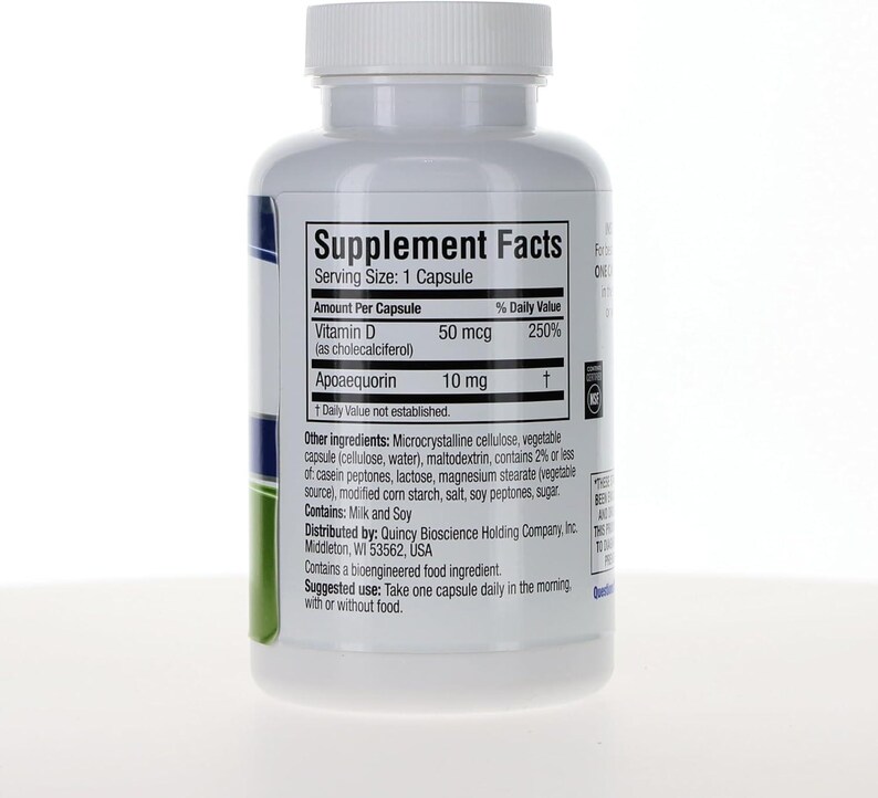 May include: A white plastic supplement bottle with a screw-top lid featuring a Supplement Facts label. The label lists Vitamin D 50 mcg and Apoaequorin 10 mg per capsule, with ingredients including microcrystalline cellulose, milk, and soy.