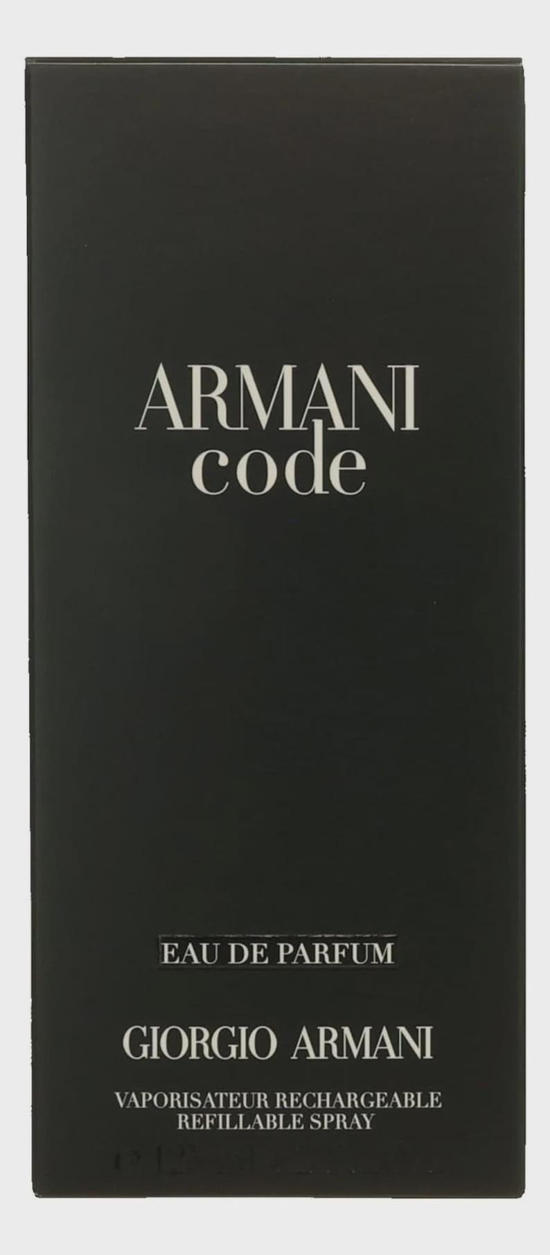 May include: Black rectangular box of Armani Code Eau de Parfum. The brand name "ARMANI code" is in white, above the text "EAU DE PARFUM" and "GIORGIO ARMANI". The box also says "VAPORISATEUR RECHARGEABLE REFILLABLE SPRAY".