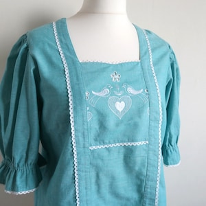 Austrian Embroidered Blouse, Turquoise Blue Dirndl Tunic, Cotton Top, White Heart & Magpies, Short Puffed Sleeves, Square Neck, Medium M/L