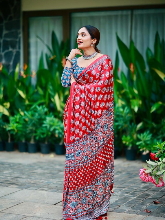 Soft Modal Satin Silk Ajrakh Print Saree with Mirror Work & Tassels