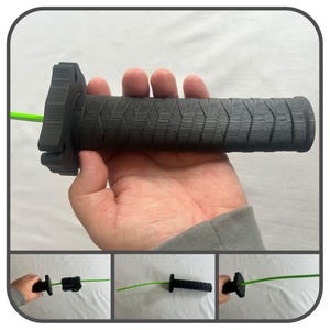 May include: A black textured handle with a geometric pattern, held in a hand. A green cable extends from the handle. Additional images show the handle and cable from different angles.