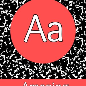May include: A rectangular graphic featuring a black and white speckled composition notebook pattern. A large coral-colored circle in the center displays the uppercase and lowercase letters Aa in white. A coral-colored horizontal bar at the bottom reads Amazing.