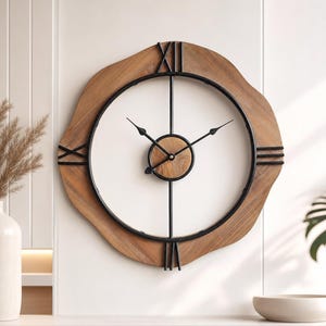 May include: A wall clock featuring a natural wood slab base with an irregular edge. It has a black metal circular frame, black metal hands, and black Roman numerals at the twelve, three, six, and nine o'clock positions. A small wood circle sits at the centre.