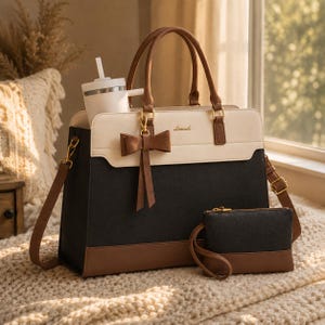 May include: A black, cream, and brown tote bag with a matching wallet. The tote has a bow and a white water bottle inside. The bag has a top handle and a shoulder strap. The wallet has a wrist strap.