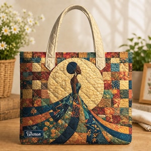 May include: A quilted tote bag featuring a patchwork design of blue, orange, and yellow squares. The centre displays a silhouette of a person in a flowing gown against a large circular background. A small rectangular label reads "Tharon".