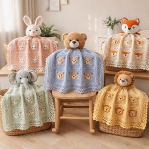 May include: Five crocheted security blankets featuring plush animal heads including a rabbit, bear, elephant, fox, and lion. Each blanket is made of square motifs with matching animal face appliques in pastel colors: pink, blue, cream, green, and yellow.