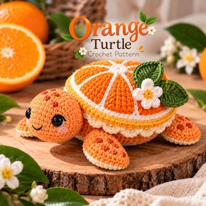 May include: A crocheted turtle toy with a shell shaped like an orange slice, featuring orange and white yarn, a white flower, and green leaves. The text Orange Turtle Crochet Pattern is visible above the toy, surrounded by oranges.