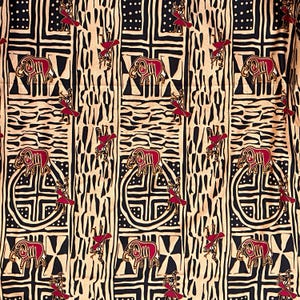 May include: A patterned fabric featuring a repeating design of red elephants, figures, and geometric shapes on a beige background. The design includes black vertical stripes and square patterns, creating a bold, artistic look.