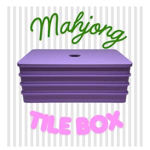 May include: A purple Mahjong tile box with a lid and a hole in the centre. The words "Mahjong" in green script and "TILE BOX" in pink bubble letters are above and below the box. The background has vertical grey and white stripes.