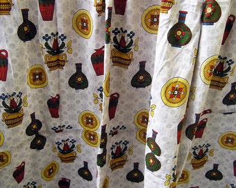 May include: White fabric with a repeating pattern of colorful floral designs and vases. The pattern includes red, green, yellow, and blue colors.