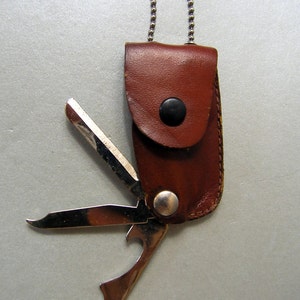 Vintage Knife with Tools Set in a small leather case