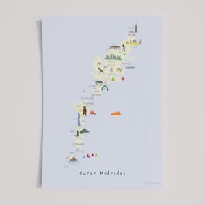 May include: A light blue print of the Outer Hebrides, featuring illustrated landmarks and the text "Outer Hebrides". The map includes drawings of a lighthouse, a bear, a boat, and other icons. The print is on a white background.