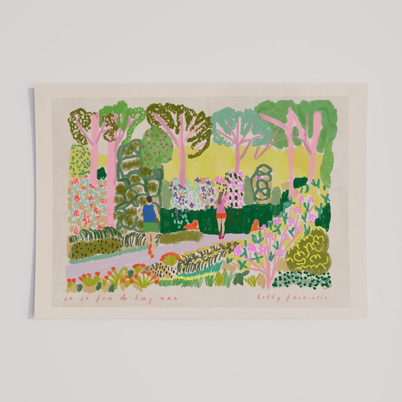 May include: An art print depicting a park scene with a path, trees, and figures. The artwork features a palette of pink, green, and yellow hues. Text at the bottom reads "in it for the long run" and the artist's signature.
