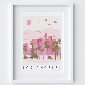 K&ouml;nnte beinhalten: Eine rosa und rote Illustration der Skyline von Los Angeles mit Palmen und einer rosa Sonne. Der Text "LOS ANGELES" befindet sich am unteren Rand des Bildes.