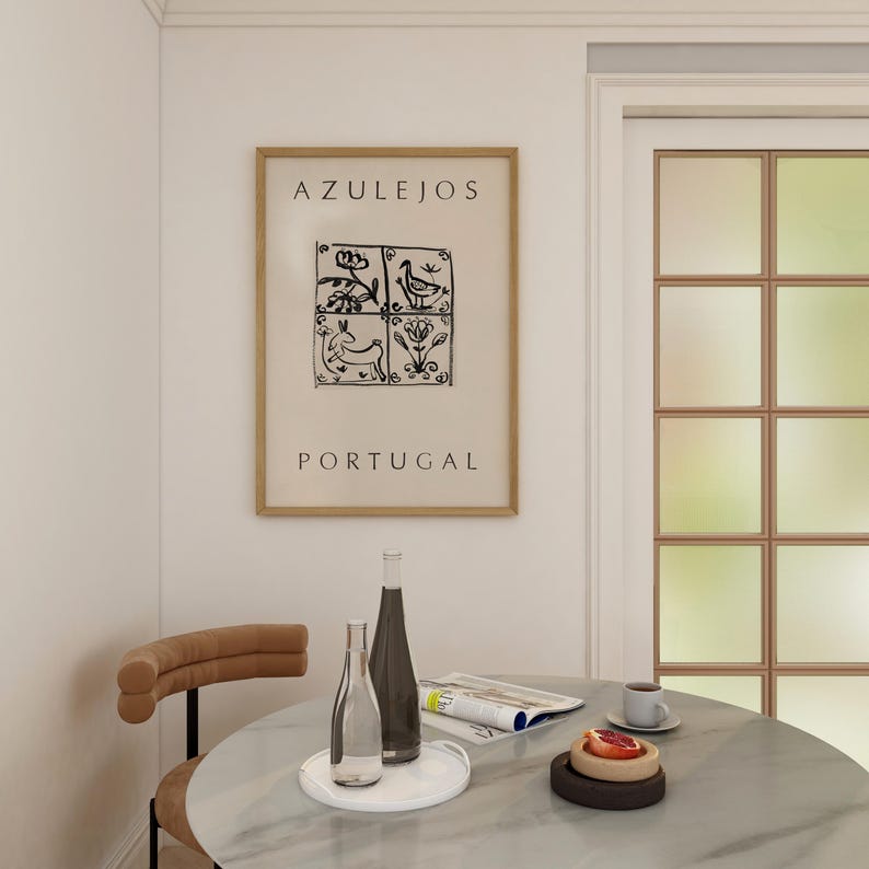 May include: A framed poster with the text "AZULEJOS PORTUGAL" and a black and white illustration of four tiles with floral and animal designs.