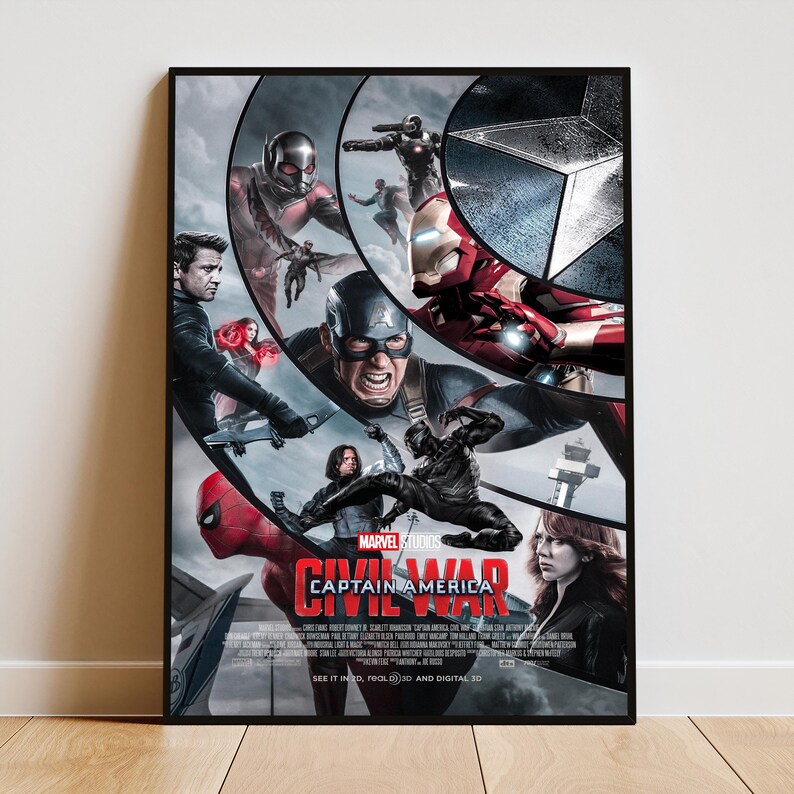 May include: A framed movie poster for Marvel Studios' Captain America: Civil War. The poster features a collage of characters including Captain America, Iron Man, and Spider-Man. The title is prominently displayed with the Marvel Studios logo.