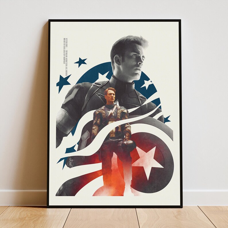 May include: A framed poster featuring Captain America. The artwork showcases a grayscale image of the character's face, with a smaller, full-body image below. Patriotic red, white, and blue elements, including stars and stripes, are incorporated into the design.