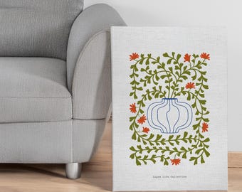 May include: A rectangular canvas print featuring a white background with a central blue line-art vase containing green leafy vines and small red flowers. The text "Legom Life Collection" is printed in small black letters at the bottom center.