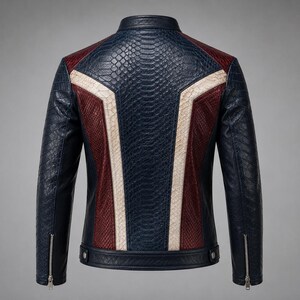 May include: A jacket featuring a textured snakeskin pattern in navy blue, deep red, and off-white. The back displays a color-blocked design with a central navy panel, flanked by red sections and white stripes. It includes silver-tone metal zippers.