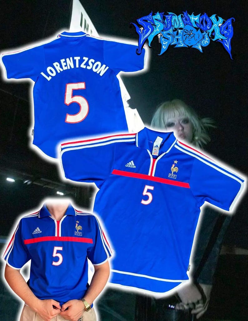 May include: Three blue football shirts with white and red detailing. One shirt has the name "LORENTZSON" and the number "5" on the back. The other two shirts have the number "5" on the front. The Adidas logo is visible on two of the shirts.