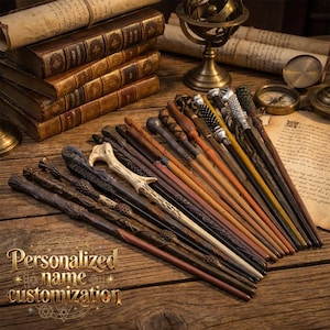 May include: A collection of various wooden wands with intricate carved details, textures, and finishes, arranged on a wooden surface alongside stacked antique books, a brass armillary sphere, and a compass, with the text Personalized name customization.
