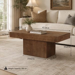 May include: A rectangular brown wooden coffee table with a solid block base. The table measures 47.24 inches in length, 23.62 inches in width, and 19.69 inches in height, with a 4.72 inch thick top and a 300 pound weight capacity.