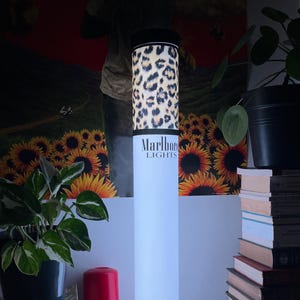 price marlboro cigarette lamp This vintage pack is a striking example of mid-to-late 20th century tobacco advertising. Promotional displays like this were once common, part of a bold visual language used by tobacco Marlboro Cigarettes Smoke Artwork Neon