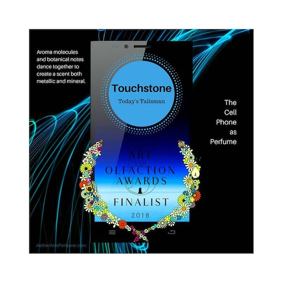 Touchstone: Metal + Mineral, Earth + Air, join together in this Fragrance. A modern talisman we all carry, the Cell Phone as Perfume.