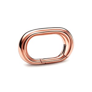 May include: A rose gold-toned oval spring ring clasp with a polished, reflective metallic finish. The jewelry component features a hinged opening mechanism along one side, allowing it to function as a connector for chains or charms.