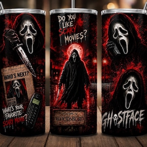 May include: A cylindrical tumbler featuring a dark, horror-themed graphic with the Ghostface character, a knife, a telephone, and a newspaper headline reading WHO'S NEXT? Text includes DO YOU LIKE SCARY MOVIES?, WHAT'S YOUR FAVORITE SCARY MOVIE?, and WOODSBORO.