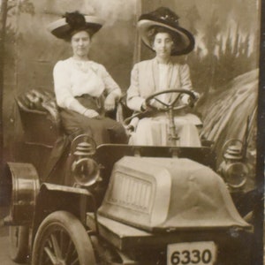 vintage  woman drivers  automobile      photo of two woman driving car