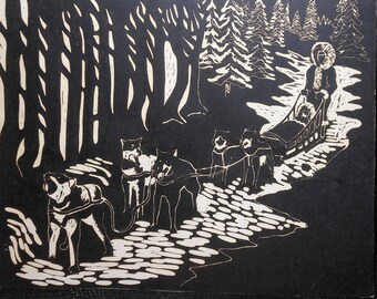 vintage  Alaska   dog sledding wood block print of dog musher on trail