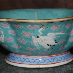vintage  Asian   blue  pottery     signed  with white fling cranes