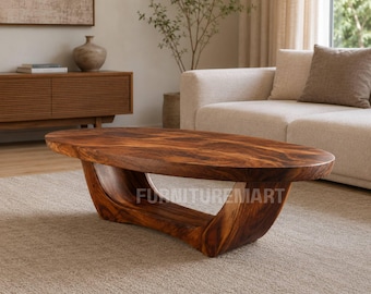 Tavolino ovale in legno massello, tavolino centrale in legno scultoreo realizzato a mano, moderno tavolo da soggiorno dalle linee organiche con base curva
