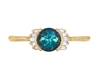 Teal Sapphire Ring with Baguette Diamond Wings