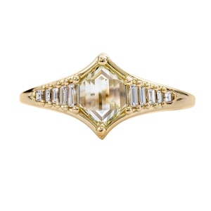 Art Deco Inspired Engagement Ring with One of a Kind step cut Diamond