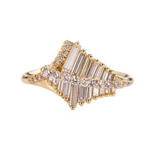 Asymmetrical Baguette Cluster Ring with Round Diamond Beams