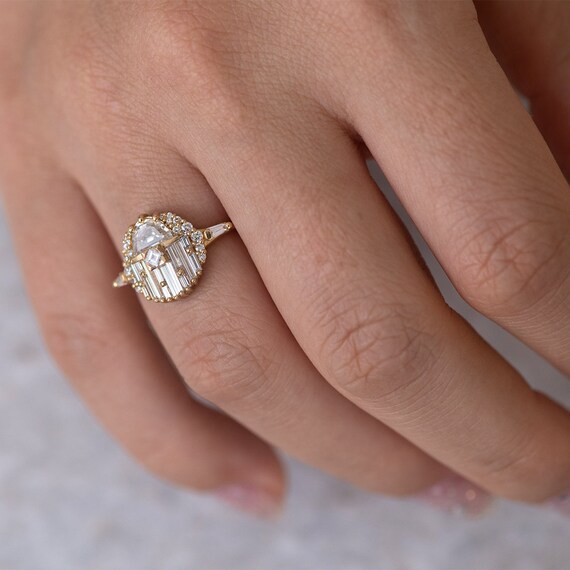 Floating Pear Cut Diamond Engagement Ring in A Classic Style