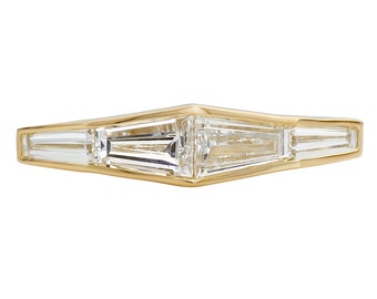 Diamond Engagement Ring with a Tapered Baguette Formation