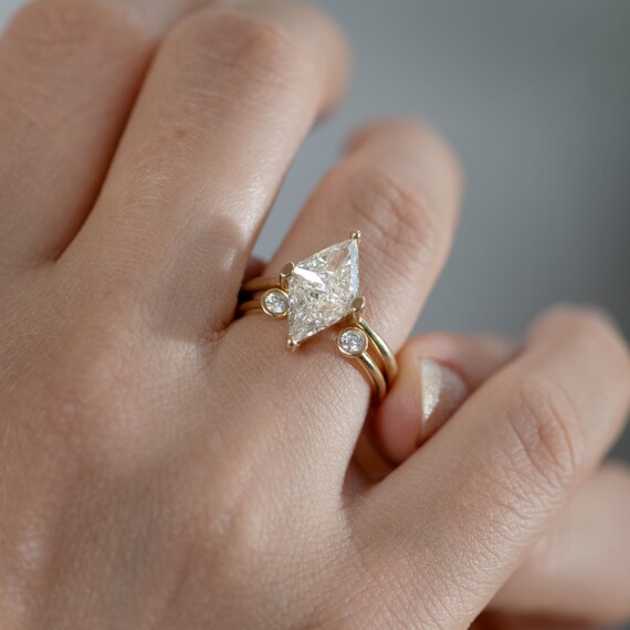 Rhombus shaped ring deals