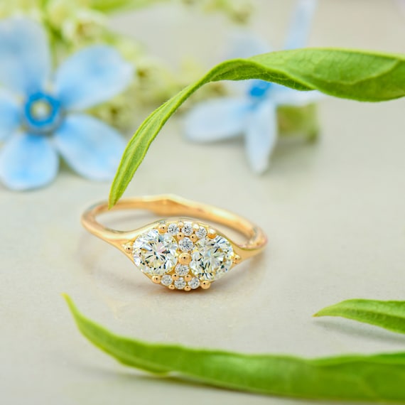 Floating Pear Cut Diamond Engagement Ring in A Classic Style