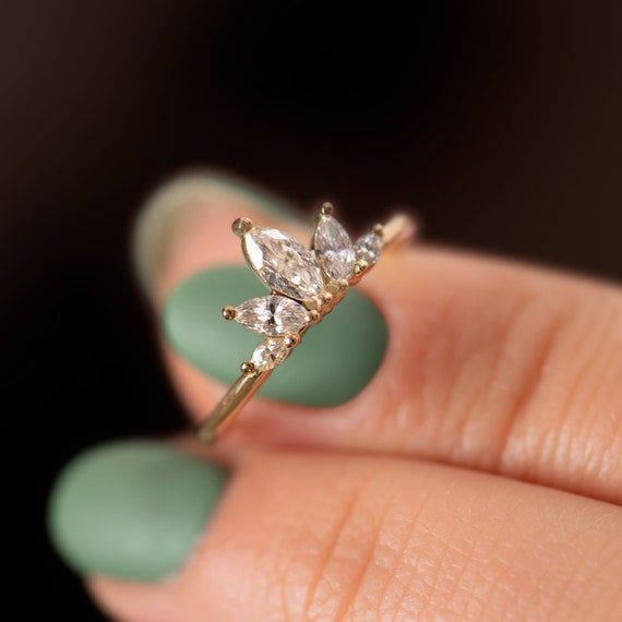 Floating Pear Cut Diamond Engagement Ring in A Classic Style