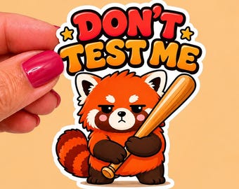 May include: A sticker featuring a cartoon red panda holding a baseball bat. The sticker has the text "DON'T TEST ME" in red and orange bubble letters. The red panda has a stern expression.
