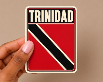 May include: A rectangular sticker featuring the flag of Trinidad and Tobago with a red background, a diagonal black stripe bordered by thin white lines, and the word TRINIDAD in bold white capital letters inside a black rectangular header.