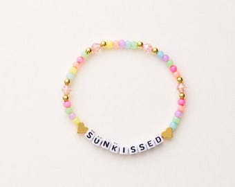 Sunkissed beaded bracelet multi color. 14k gold plated spacer beads.