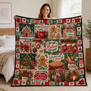 May include: A rectangular throw blanket featuring a patchwork design of Christmas-themed illustrations including a gingerbread house, hot cocoa, cookies, stockings, a decorated tree, a pie, and gifts with text reading Believe, Baked with Love, and Merry Christmas.